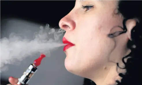  ?? Joe Raedle ?? > E-cigarettes are not a ‘gateway to smoking and are beneficial in helping smokers to quit’, the RCP report found