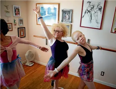  ?? PHOTO: LA TIMES ?? Bibiana Mashamba, left, and her younger sister Tindi, right, take a ballet lesson with Liz Cantine, far left, in Palos Verdes, California. The sisters have been granted asylum to stay in the US.