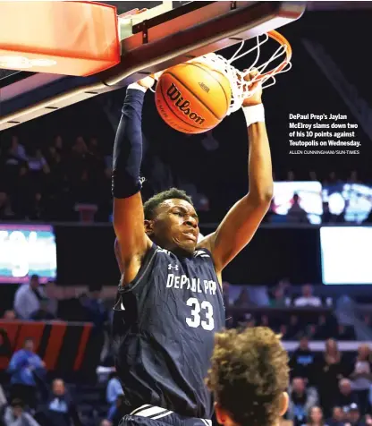  ?? ALLEN CUNNINGHAM/SUN-TIMES ?? DePaul Prep’s Jaylan McElroy slams down two of his 10 points against Teutopolis on Wednesday.