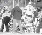  ?? SEAN KILPATRICK/AP ?? Panthers center Vincent Trocheck was taken off the ice on a stretcher after suffering a lower-body injury during the Panthers’ win over to the Senators on Monday in Ottawa.