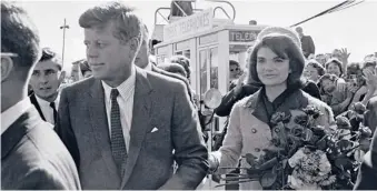  ?? | AP ?? President John F. Kennedy and his wife, Jacqueline, arrive at Love Field airport in Dallas on Nov. 22, 1963.