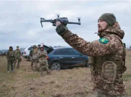  ?? SEAN GALLUP/GETTY ?? A drone is readied for takeoff in a civilian training session Wednesday in Lviv, Ukraine. The U.S. will send several types of drones to Ukraine as part of a new aid package.