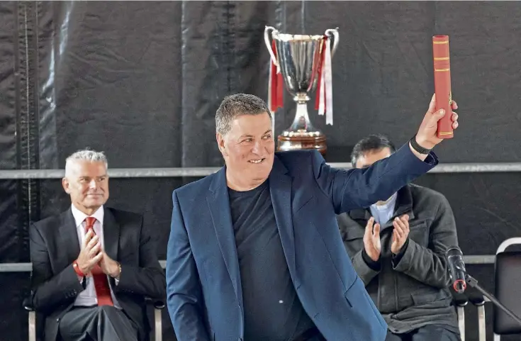  ?? Picture by Wullie Marr. ?? SCROLL OF HONOUR: Former Aberdeen striker Mark McGhee receives his freedom of the city scroll during a ceremony at Pittodrie on Friday.