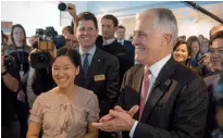  ??  ?? Above, left: Marita with her robot, Teleport. Left: with Prime Minister Malcolm Turnbull. Above, right: Genevieve on-set with American actress Jamie Brewer. Right: Students of Bus Stop Films.