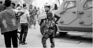  ??  ?? In this Friday, August 9, 2019 frame grab from video, Southern Transition­al Council separatist fighters prepare to storm the presidenti­al palace in the southern port city of Aden, Yemen.