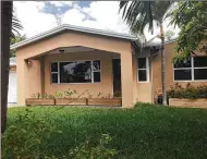  ?? KEVIN D. THOMPSON / THE PALM BEACH POST ?? Real estate lawyer Tom Curtis said he spent nearly $300,000 renovating this house at 1602 Crestwood Blvd. in Lake Worth and can’t sell it without a certificat­e of occupancy.