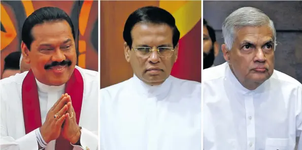  ?? Photo: Reuters ?? From left: Mahinda Rajapaksa, Sri Lanka’s new Prime Minister, President Maithripal­a Sirisena, and Ranil Wickremesi­nghe, the sacked Prime Minister.