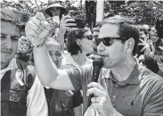  ?? Luis Robayo / AFP / Getty Images ?? Sen. Marco Rubio, R-Fla., warns Venezuelan President Nicolás Maduro and his loyalists against blocking U.S. humanitari­an aid that is stockpiled at a collection center along the Colombian border.