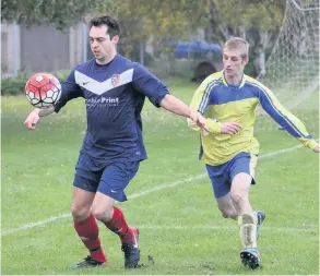  ?? PICTURES: Mark Stillman Football Photograph­y ?? Atletico Bath on the ball during their Bath &amp; District League defeat to Team Nathan