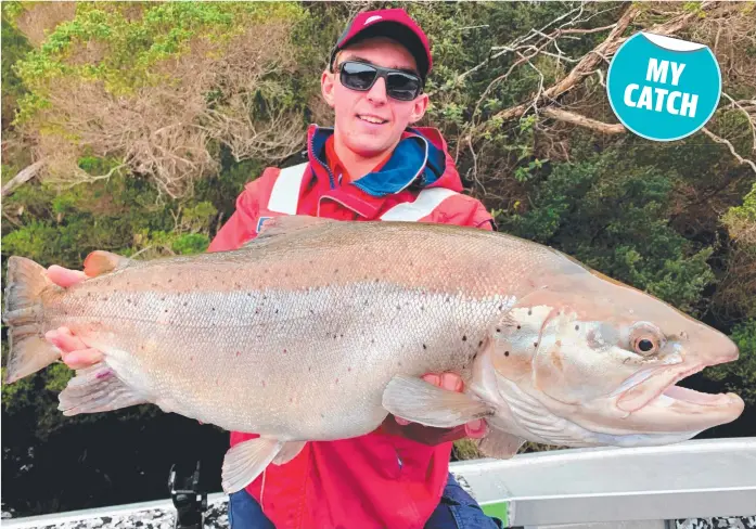  ?? ?? Sam Spinks was rapt with this whopper catch of a big sea-run trout, weighing a massive 7.25kg, he caught on the West Coast recently.