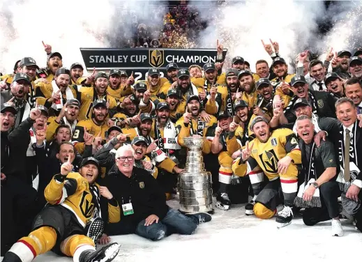  ?? AP ?? The Golden Knights pose with the Stanley Cup after defeating the Panthers to win the title Tuesday. Their nine goals in the clincher tied a record for a game in the Final.