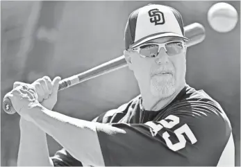  ?? JAKE ROTH, USA TODAY SPORTS ?? Padres coach Mark McGwire says he took hits after his admission, “but I moved on from it.”