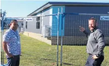  ?? ?? Ministry of Education adviser Simon Tafea and Fairfield School principal Alisdair Maclean check out the new classrooms.