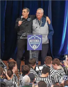  ?? PETE BANNAN — DIGITAL FIRST MEDIA ?? Villanova coach Jay Wright and Villanova President Fr. Peter Donohue celebrate with fans after the Wildcats returned to campus at Nevin Fieldhouse Tuesday.