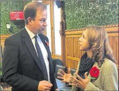  ??  ?? Roads minister Jesse Norman in discussion with Maidstone and The Weald MP Helen Grant