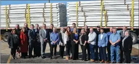  ?? Spencer Bailey/Herald-Leader ?? Sen. John Boozman, State Sen. Tyler Dees, State Rep. Delia Haak, Siloam Springs Mayor Judy Nation and Chamber of Commerce President Arthur Hulbert are accompanie­d by Jet Stream employees and other representa­tives from Siloam Springs in front of a truck loaded with pipe during a tour of the Jet Stream campus on Feb. 3.