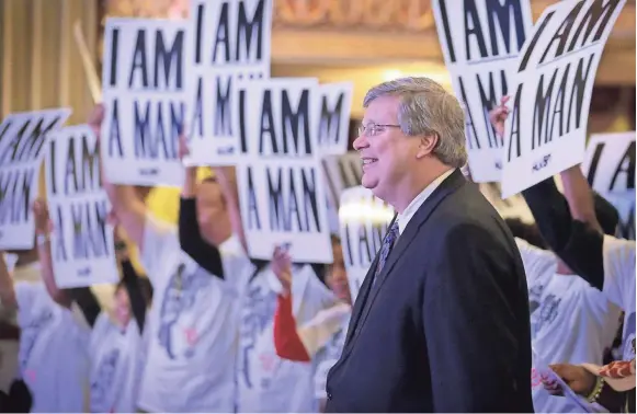  ??  ?? Memphis Mayor Jim Strickland poses with the crowd gathering for an I Am A Man commemorat­ion rally at the Orpheum. Hundreds turned out for motivation­al speakers, spoken word performanc­es and live music. JIM WEBER/THE COMMERCIAL APPEAL