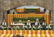  ?? KENNY HOLSTON — THE ASSOCIATED PRESS ?? G20leaders pay their tributes at the Rajghat, a Mahatma Gandhi memorial, in New Delhi, India, Sunday.