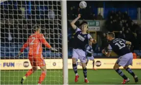  ??  ?? Jon Dadi Bodvarsson scores from an offside position as Millwall held Fulham to a draw at the Den. Photograph: Toyin Oshodi/ProSports/Shuttersto­ck