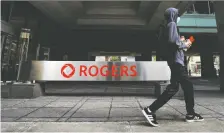  ?? CARLOS OSORIO/REUTERS ?? Lawyers expect Rogers and Shaw to find buyers for Shaw's Freedom wireless unit with a proven record, and propose a sale of some stores or spectrum to mitigate concerns about competitio­n.