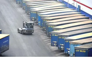  ??  ?? Containers are pictured at a loading terminal in the port of Kiel, Germany. — Reuters photo