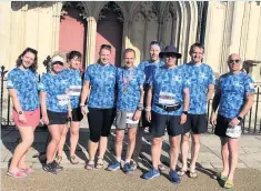  ??  ?? TROTS runners outside Winchester Cathedral during their visit to the South of England to take part in the Race to the Kings.