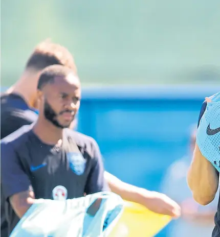  ?? Picture: Getty Images. ?? Eric Dier, right, in training at the Spartak Zelenogors­k Stadium in St Petersburg, as England prepare to face Panama on Sunday.