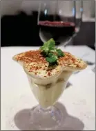  ??  ?? Round off a satisfying meal at Italian Cuisine with tiramisu for dessert.