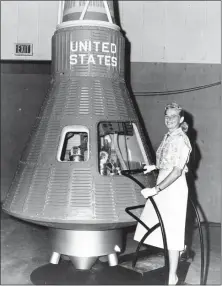  ?? NASA ?? Aviator Jerrie Cobb is seen with a Mercury capsule in this undated file photo.