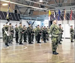  ?? SUBMITTED PHOTO ?? Lt.-col. Mark Felix, centre, leads the Second Battalion of the Royal Newfoundla­nd Regiment in parade after taking over as commanding officer at the Gallipoli Armoury in Corner Brook Saturday.