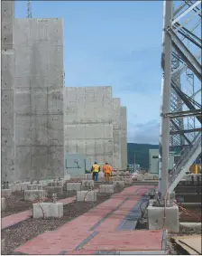  ?? PHOTO BY ASHLEY FITZPATRIC­K/THE TELEGRAM ?? Workers at the Muskrat Falls constructi­on site, August 2017.