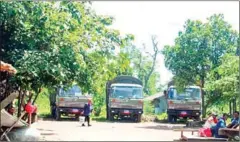  ?? SHAUN TURTON ?? Military troop carriers parked near a polling station in Ta Siem commune during last year’s commune elections.