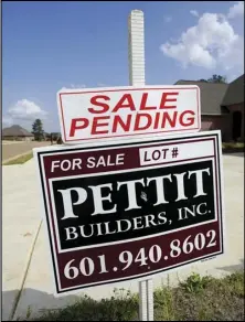  ?? ASSOCIATED PRESS ?? A “Sale Pending” sign stands along side a new driveway in Madison County, Miss., Tuesday.