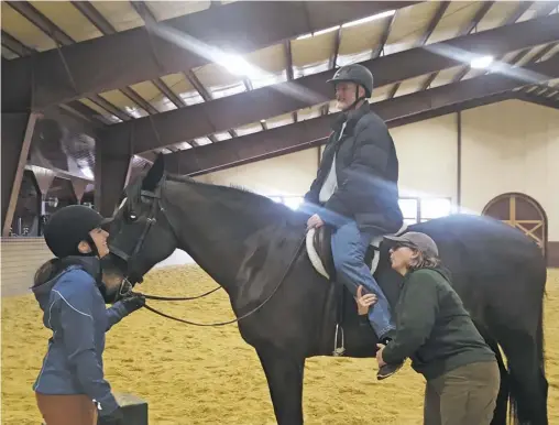  ?? PHOTOS BY CHRIS DOXZEN ?? Wendy Murdoch coaches Matt Neiswanger of High Meadow Manor on equestrian posture, the over reliance on stirrups, and the incorrect heels down concept pounded into riders over years of training, resulting in unnecessar­y tension to horse and rider.