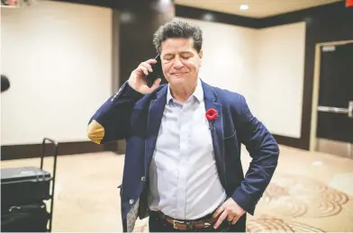  ?? CARLOS OSORIO / THE CANADIAN PRESS ?? Unifor National President Jerry Dias talks on his phone on Thursday. “We never gave up hope and, frankly,
neither did General Motors,” Dias said in an announceme­nt of the tentative agreement.