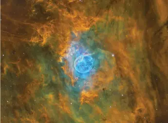  ?? ?? The Bubble Nebula (NGC 7635) in Cassiopeia appears in sharp detail in this Hα/OIII/RGB image with exposures of four, four, three, three, and three hours, respective­ly.