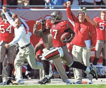  ?? PIERRE DUCHARME/REUTERS ?? Michael Spurlock returns a kickoff 90 yards to score against the Falcons in 2007. Spurlock scored the first touchdown from a kickoff in the Buccaneers’ history.