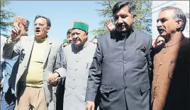  ?? DEEPAK SANSTA/HT ?? Senior Congress leader Virbhadra Singh with party MLAs staging a walkout at Vidhan Sabha in Shimla on Wednesday.