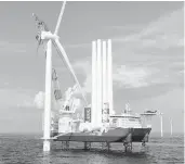  ?? DOMINION ENERGY ?? Here’s an artist’s rendering of the ship Dominion Energy ordered to install offshore wind turbines.