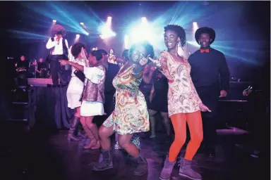  ?? PHOTOS FROM THE COMMERCIAL APPEAL FILES ?? Feb. 25, 2016: Chantalia Wray, 14, left, and Xia Gilbsy, 15, dance with other members of the Stax Music Academy during a performanc­e of “Peace, Love and Soulsville!: Memphis to Motown” at Minglewood Hall in celebratio­n of Black History Month. Roughly 900 students from area schools attended the show that highlighte­d the history and hits of Motown and Stax.