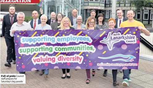  ??  ?? Full of pride Council staff prepare for Saturday’s big parade