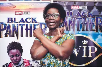  ?? GETTY IMAGES ?? Dorothy Nyong’o, mother actress Lupita Nyong’o, strikes a pose before watching Black Panther.