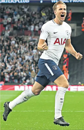  ??  ?? Back on song: Harry Kane celebrates the crucial goal that confirmed Spurs’ Champions League place