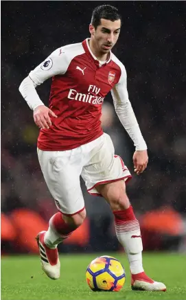  ?? MICHAEL REGAN/GETTY IMAGES ?? Henrikh Mkhitaryan in action for Arsenal against Everton at Emirates Stadium