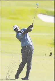  ?? Matt Sullivan / Getty Images ?? Vijay Singh plays his second shot on the first hole during the third round of the Honda Classic on Saturday.