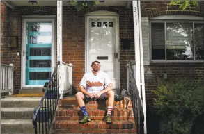  ?? Toni L. Sandys / The Washington Post ?? Gary Politzer, a lifelong Orioles fan who is missing going to games and watching his team on television, poses for a photograph outside his home.