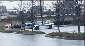  ?? Luther Turmelle / Hearst Connecticu­t Media ?? The parking lot was mostly empty — except for a police car — at IKEA in New Haven on Saturday morning.