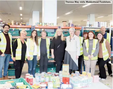  ?? ?? Theresa May visits Maidenhead Foodshare.