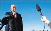  ?? [AP PHOTO] ?? President Donald Trump talks to reporters before boarding Air Force One on Thursday at Andrews Air Force Base, Md., en route to campaign stops in Montana, Arizona and Nevada.