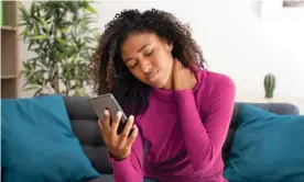  ?? Tommaso79/Getty Images/iStockphot­o ?? Pain in the neck … staring at phones is giving us hunches (posed by model). Photograph: